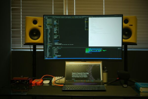 a-laptop-computer-sitting-on-top-of-a-desk